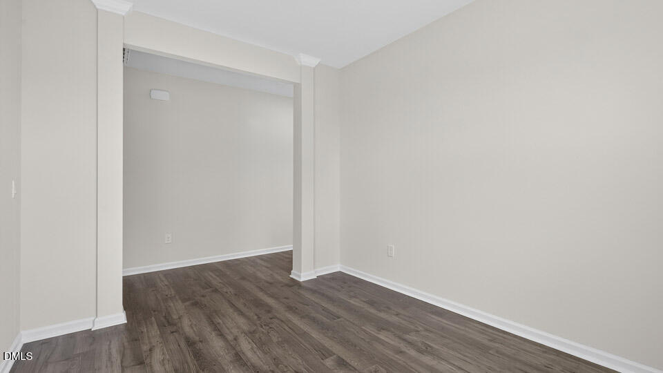181 Fair Child Road Spring Lake, NC 28390 - Photo 7 of 43 a view of an empty room with wooden floor