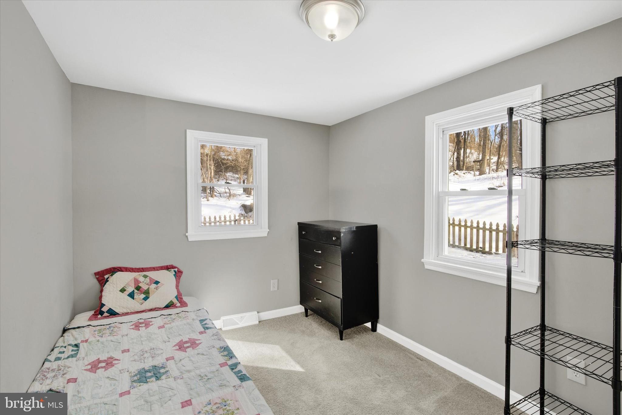 228 Porters Bridge Road Colora, MD 21917 - Photo 20 of 29 a bedroom with a bed and a window