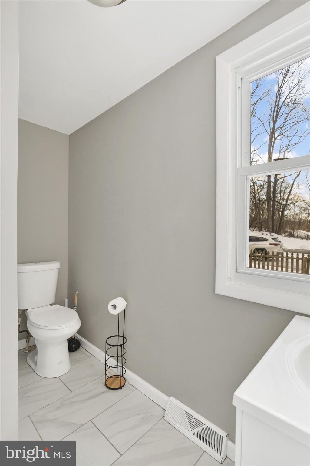 228 Porters Bridge Road Colora, MD 21917 - Photo 22 of 29 a bathroom with a toilet and a sink
