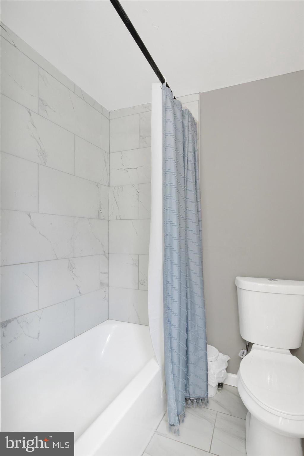 228 Porters Bridge Road Colora, MD 21917 - Photo 23 of 29 a bathroom with a toilet and bathtub