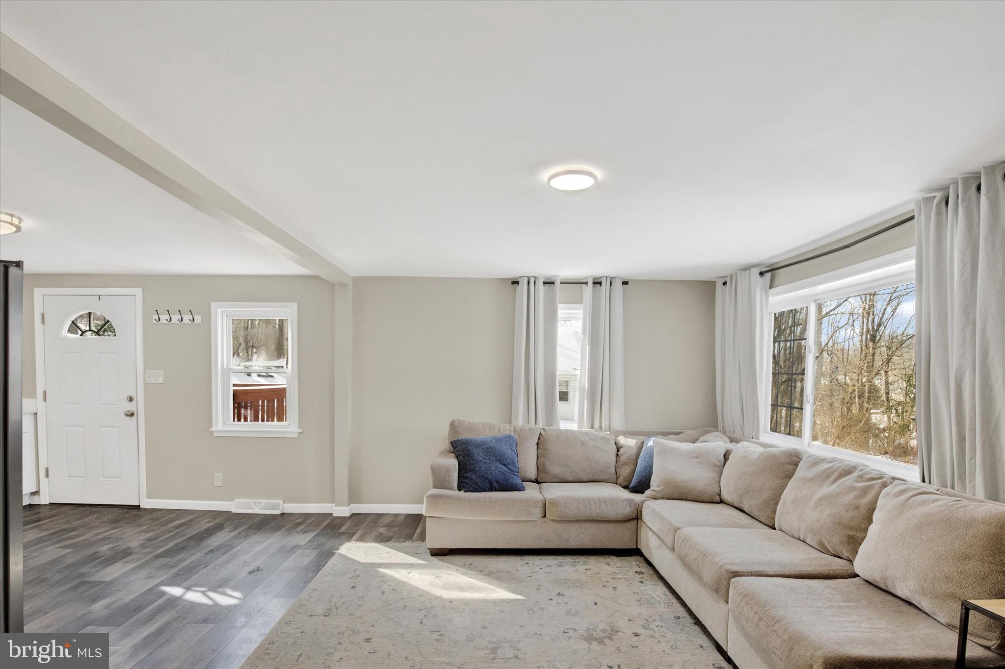228 Porters Bridge Road Colora, MD 21917 - Photo 4 of 29 a living room with furniture and windows