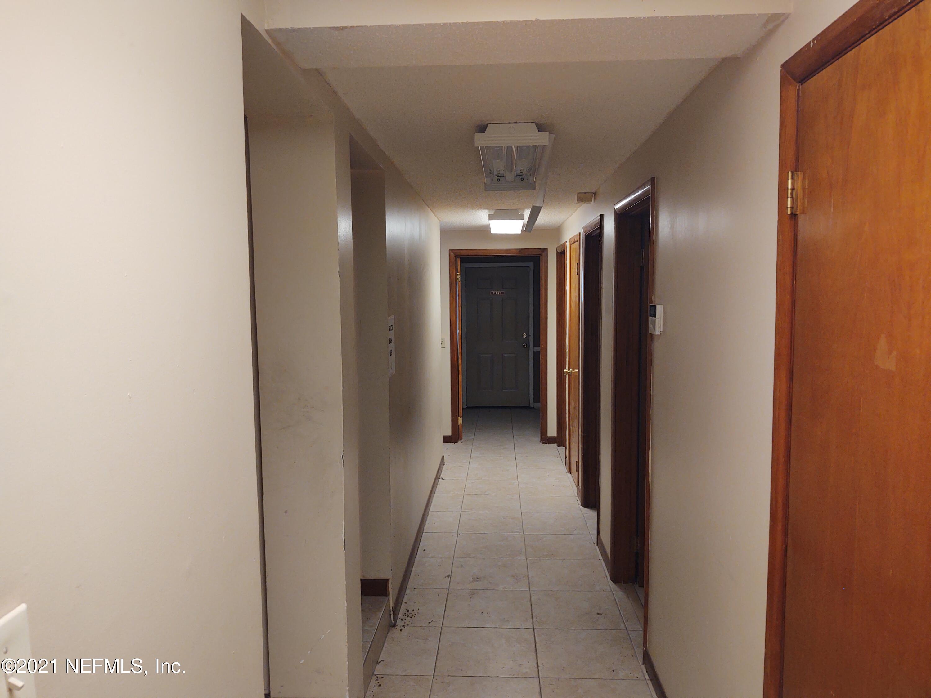 6919 Merrill Road Jacksonville, FL 32277 - Photo 4 of 19 a view of a hallway