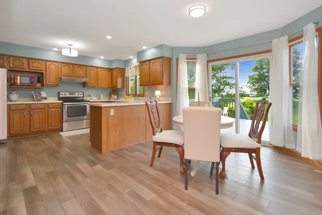 a view of a kitchen with furniture and a table