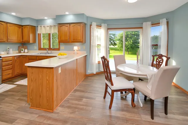 a living room with furniture window and a fireplace
