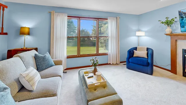 a bathroom with a double vanity sink mirror and bathtub