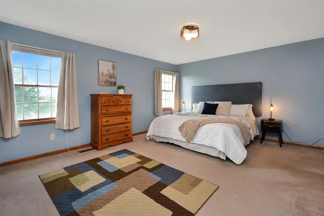 a bathroom with a shower and a sink