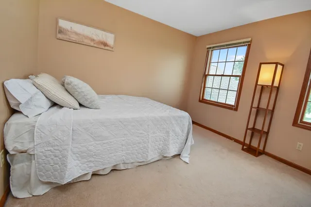 a view of a hallway with a bedroom