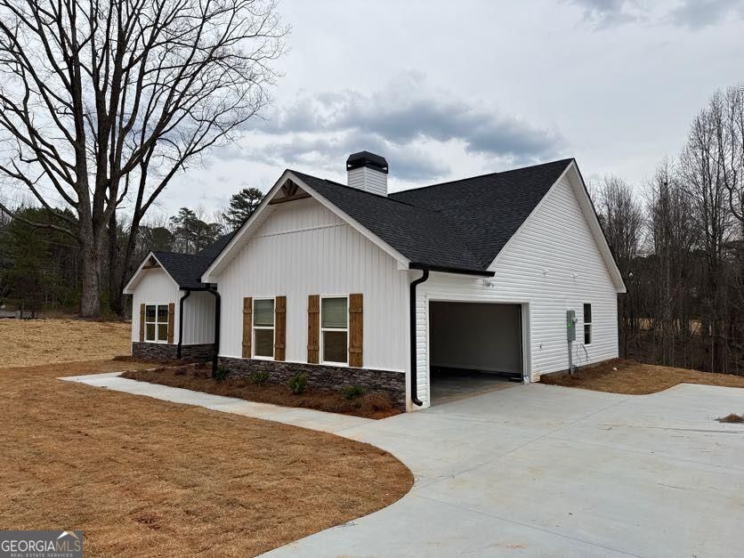 239 Cool Springs Road Clarkesville, GA 30523 - Photo 7 of 37 a front view of house with yard and trees in the background