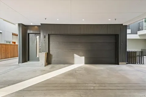 a view of staircase with white walls