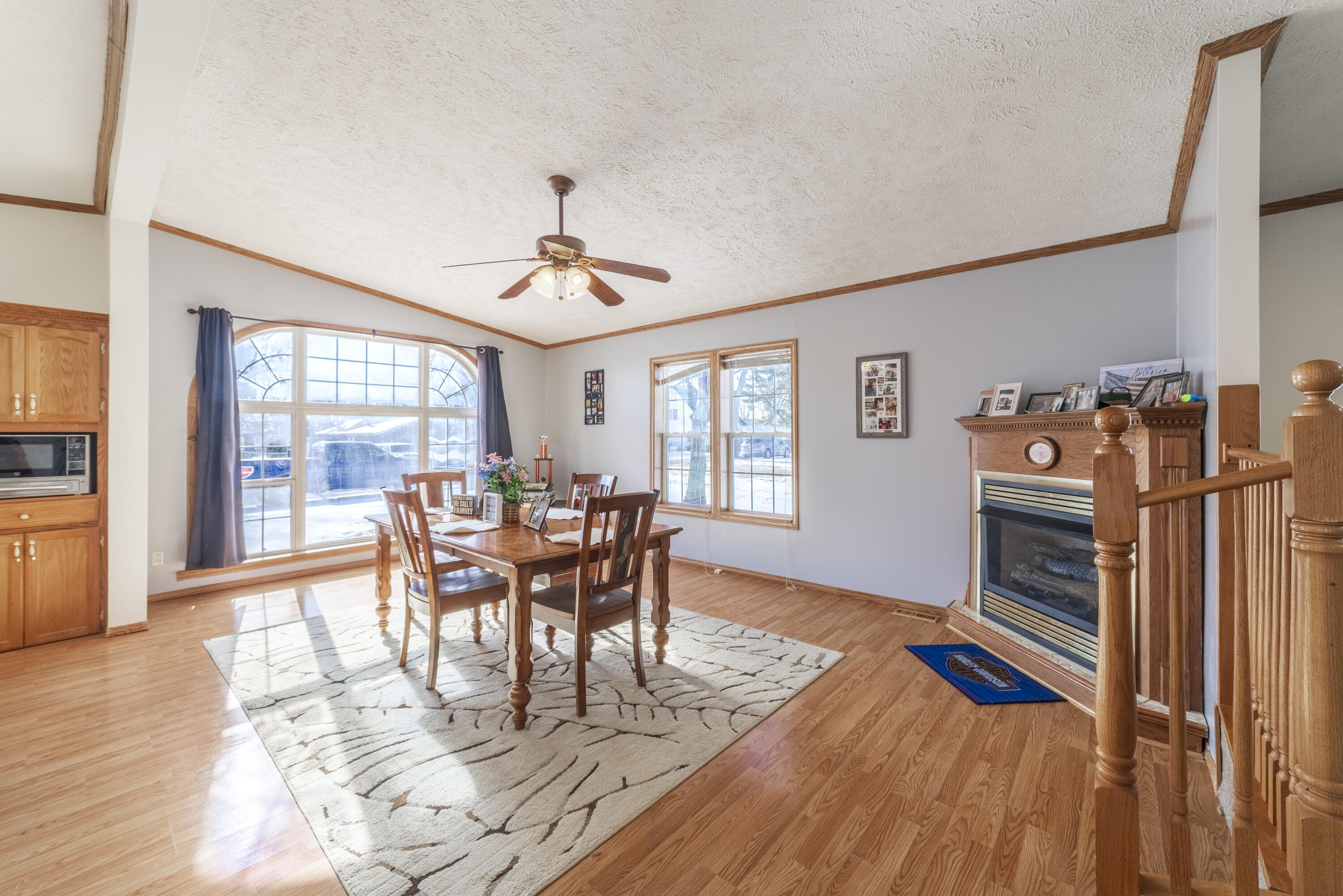 409 South Street Hebron, IN 46341 - Photo 16 of 36 a view of a dining room with furniture window and wooden floor