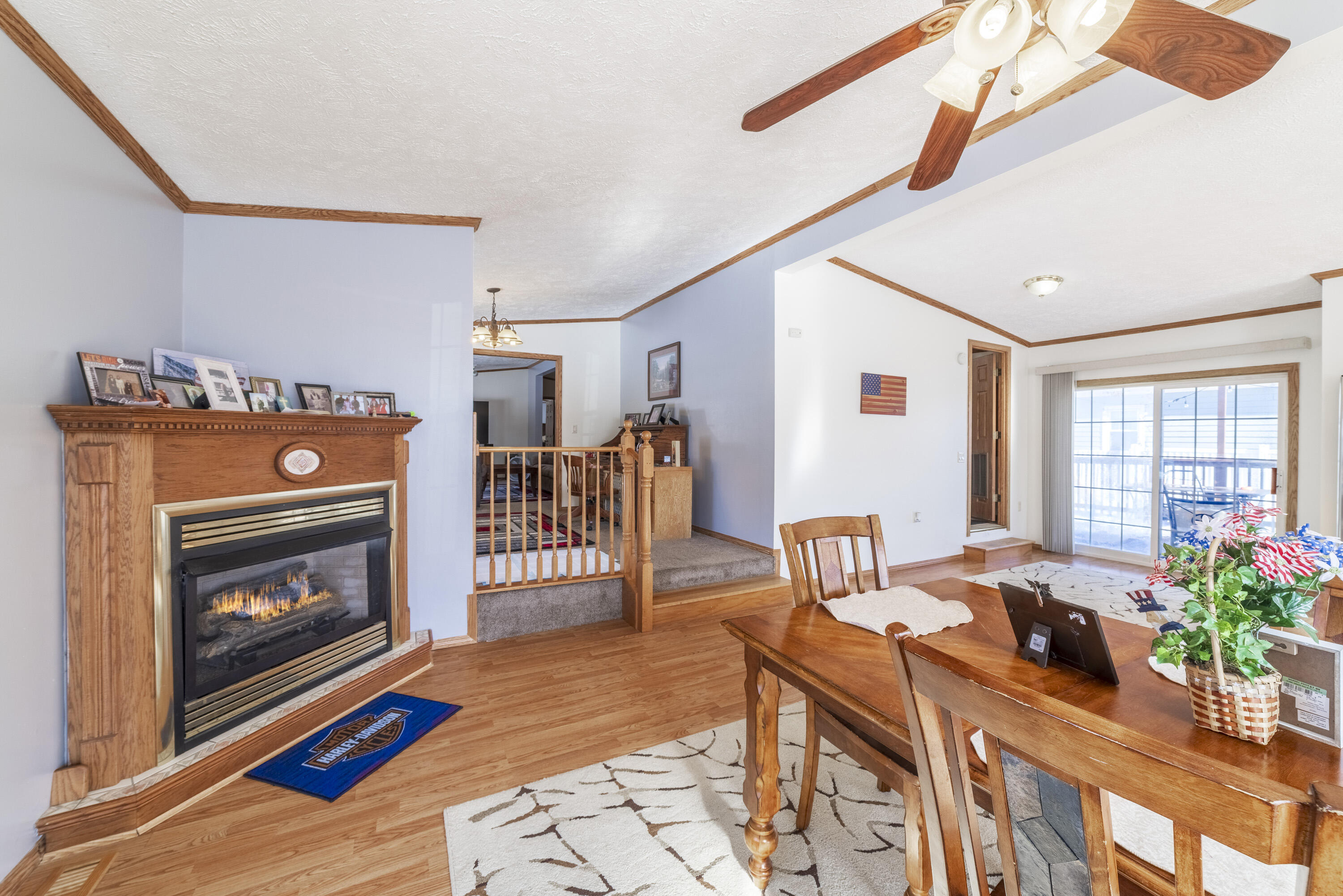 409 South Street Hebron, IN 46341 - Photo 17 of 36 a living room with furniture and a fireplace
