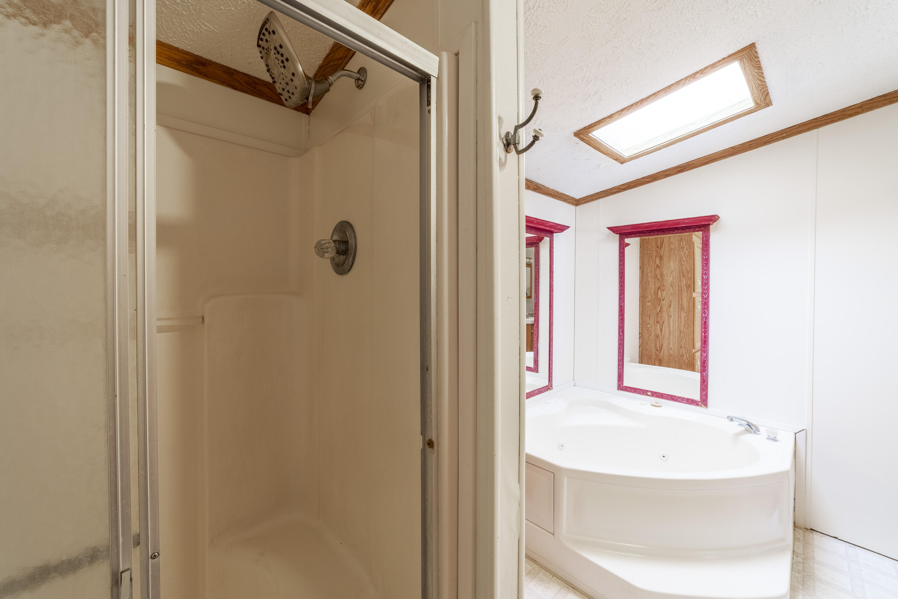 409 South Street Hebron, IN 46341 - Photo 28 of 36 a bathroom with a bathtub and a shower