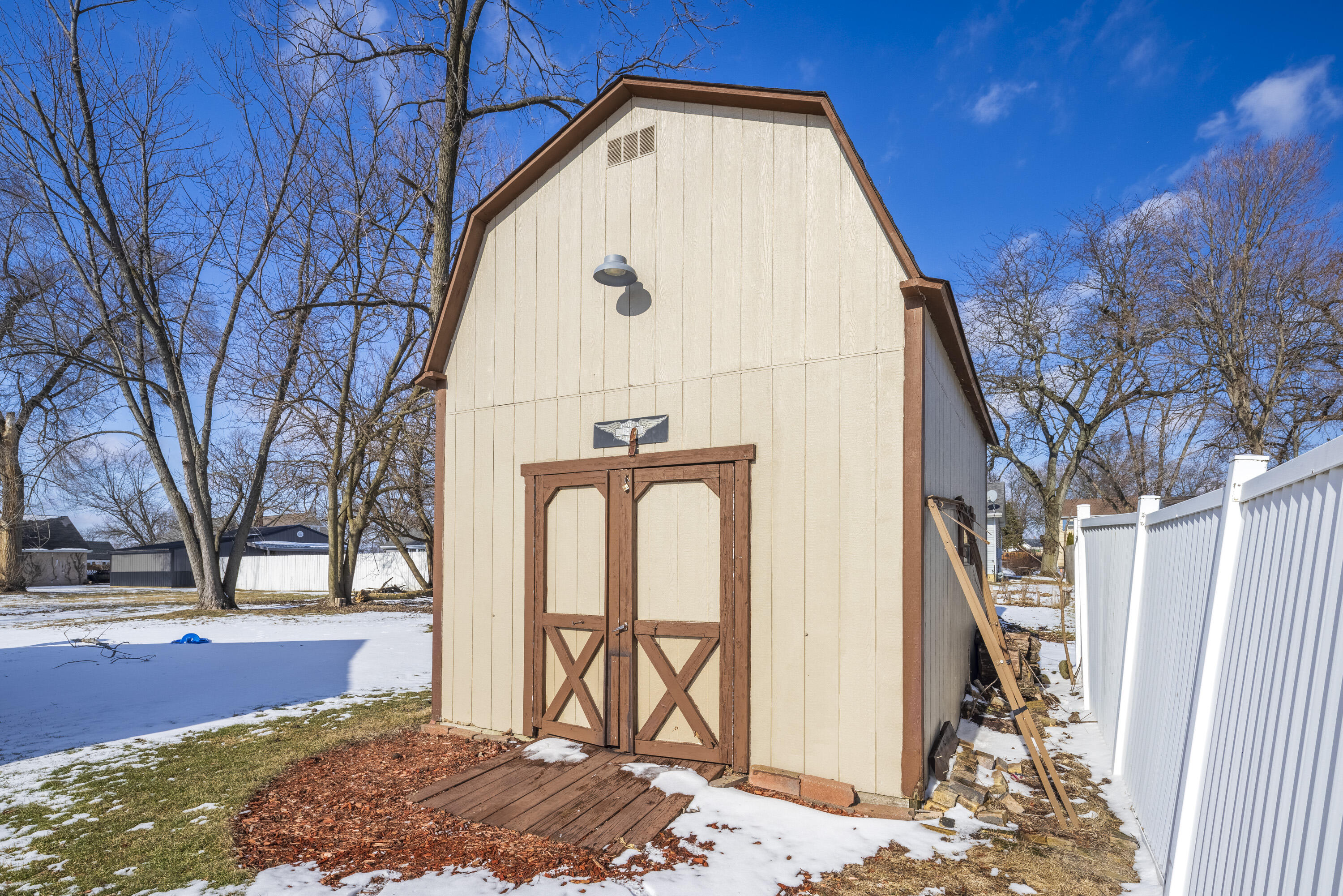 409 South Street Hebron, IN 46341 - Photo 4 of 36 a view of entrance gate of house