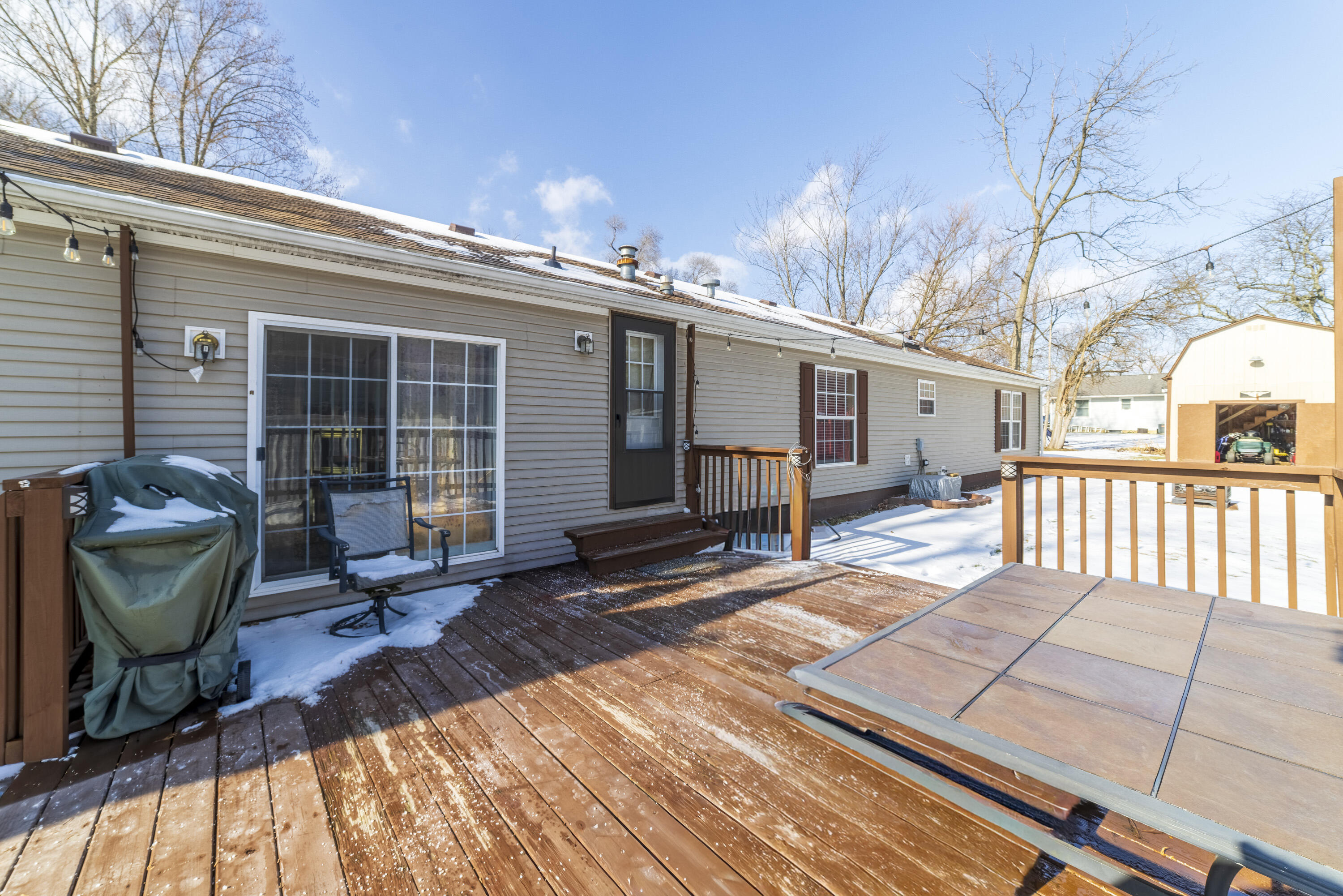 409 South Street Hebron, IN 46341 - Photo 6 of 36 a backyard of a house with seating space