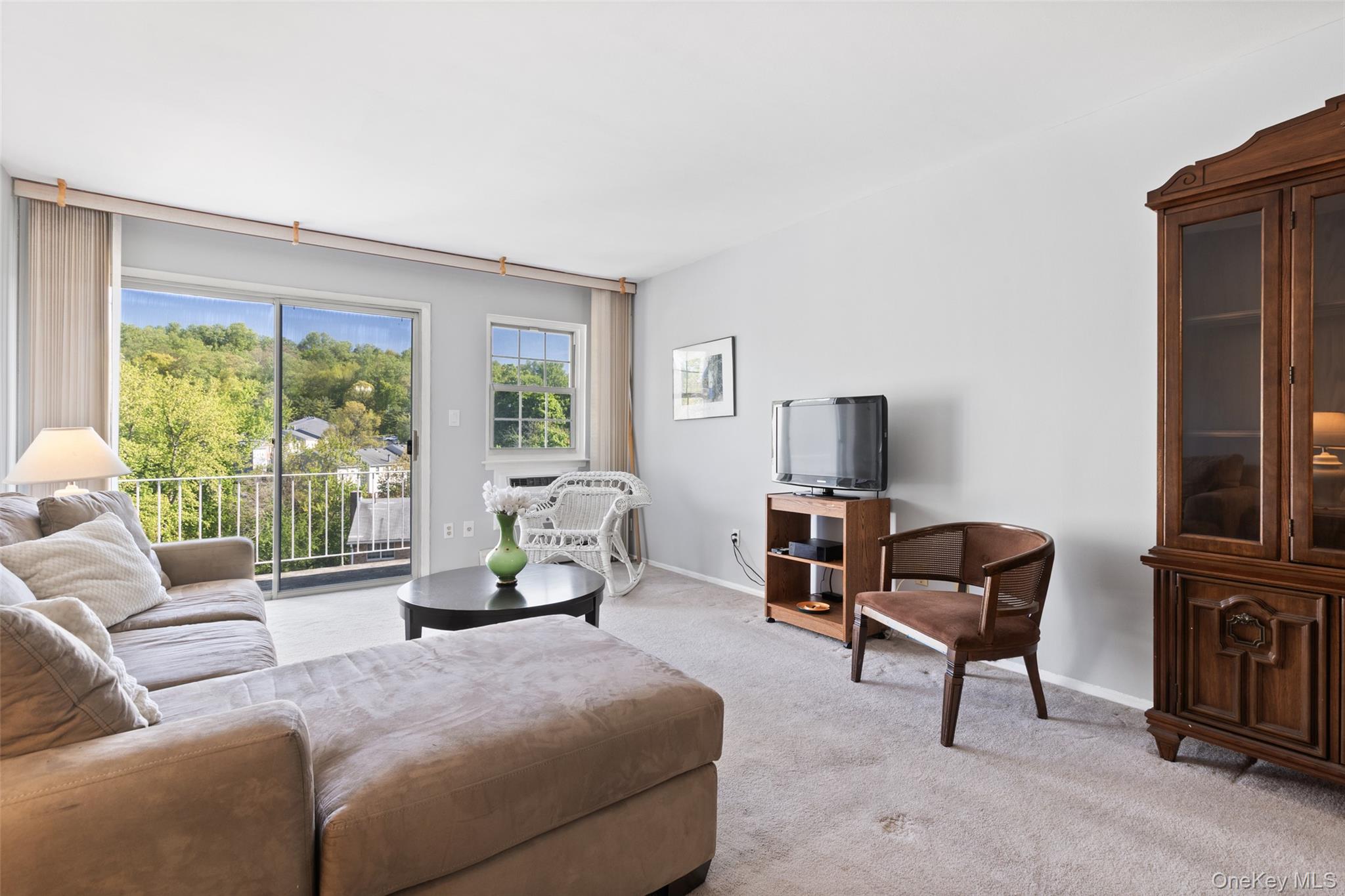 1840 Crompond Road, Unit 5C2 Peekskill, NY 10566 - Photo 3 of 27 a living room with furniture and a window