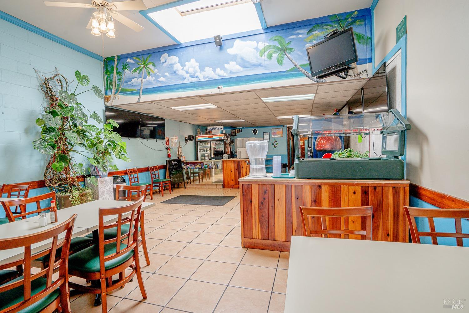 111 South State Street Ukiah, CA 95482 - Photo 7 of 14 an outdoor living space with patio furniture and a potted plant