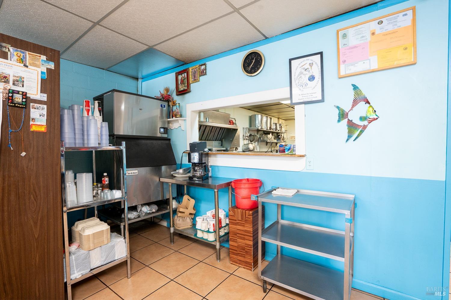 111 South State Street Ukiah, CA 95482 - Photo 9 of 14 a room with furniture and a flat screen tv