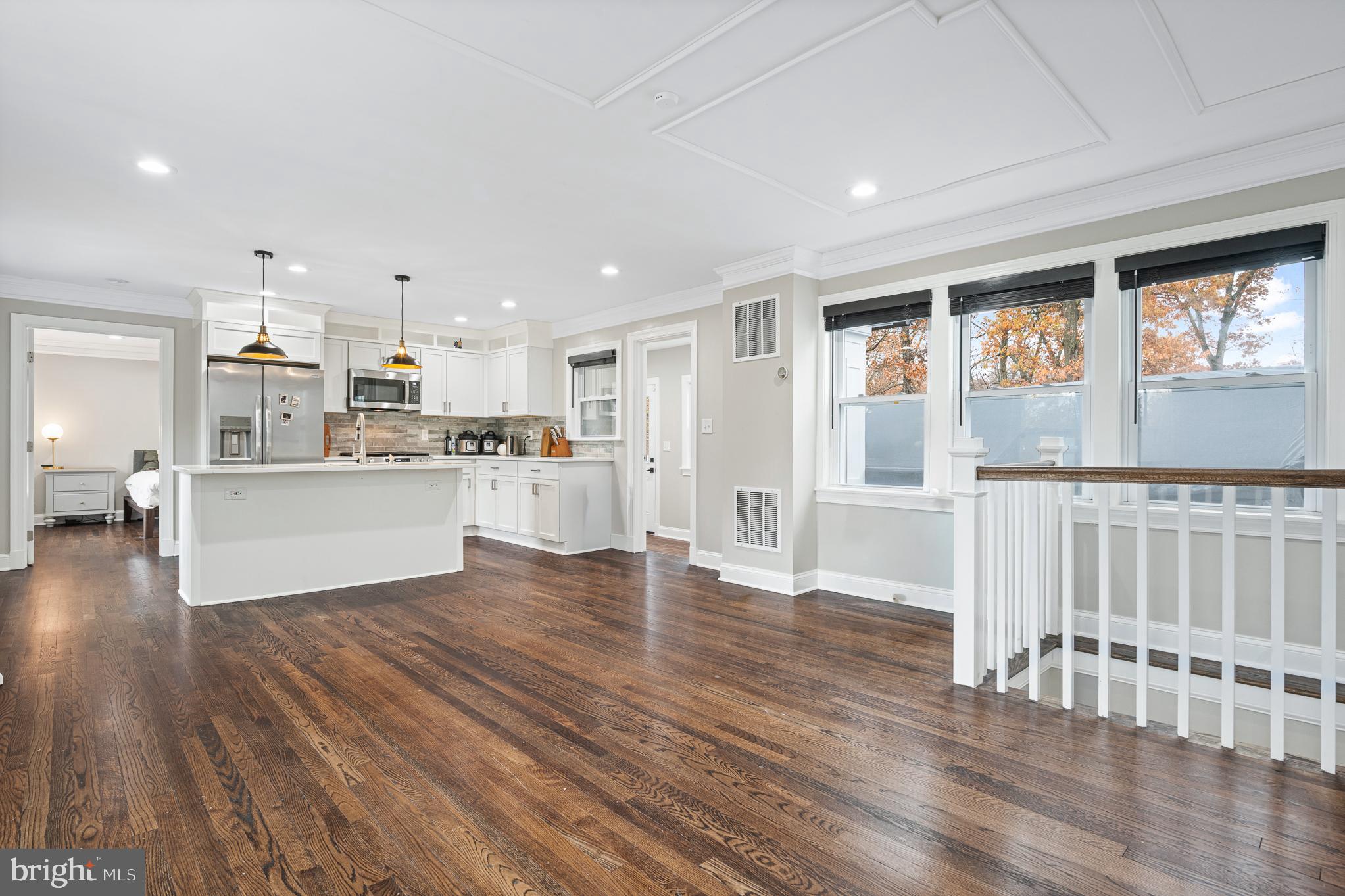9217 Fowler Lane Lanham, MD 20706 - Photo 5 of 80 a view of kitchen with wooden floor and electronic appliances