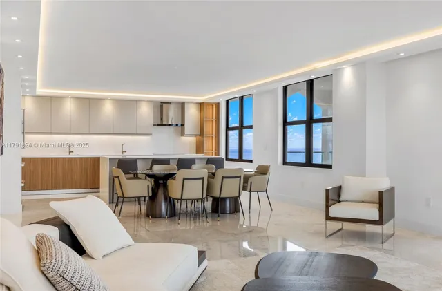 a living room with furniture and a table