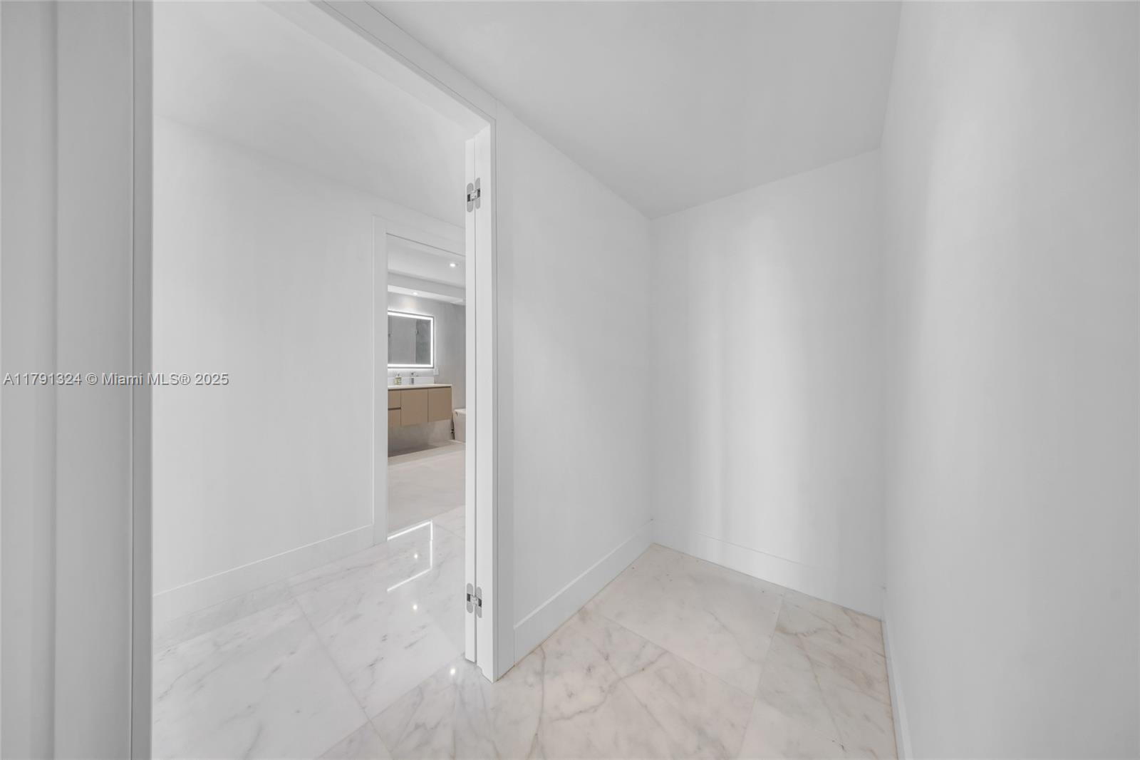 9801 Collins Avenue, Unit 17R Bal Harbour, FL 33154 - Photo 28 of 46 a view of an empty room