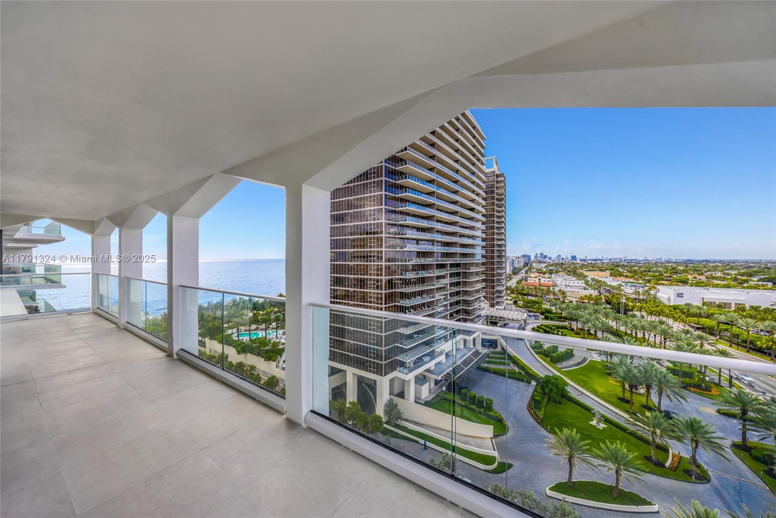 9801 Collins Avenue, Unit 17R Bal Harbour, FL 33154 - Photo 37 of 46 a city view from a balcony