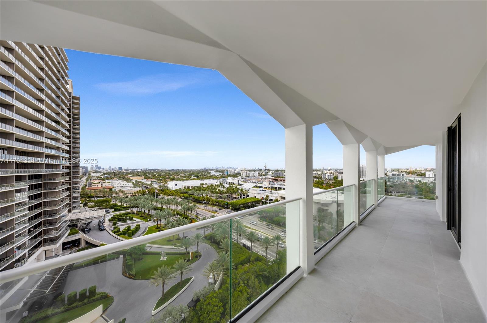 9801 Collins Avenue, Unit 17R Bal Harbour, FL 33154 - Photo 38 of 46 a view of a city from a balcony