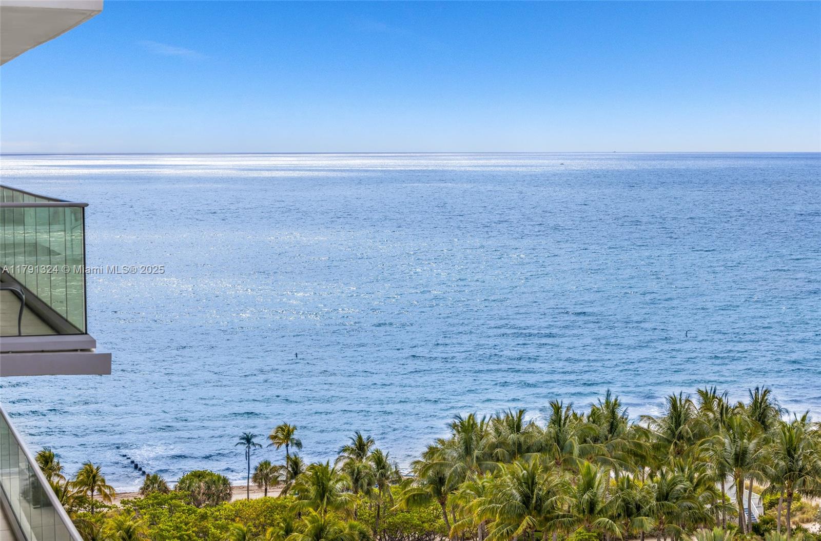 9801 Collins Avenue, Unit 17R Bal Harbour, FL 33154 - Photo 39 of 46 a view of entryway with wooden floor