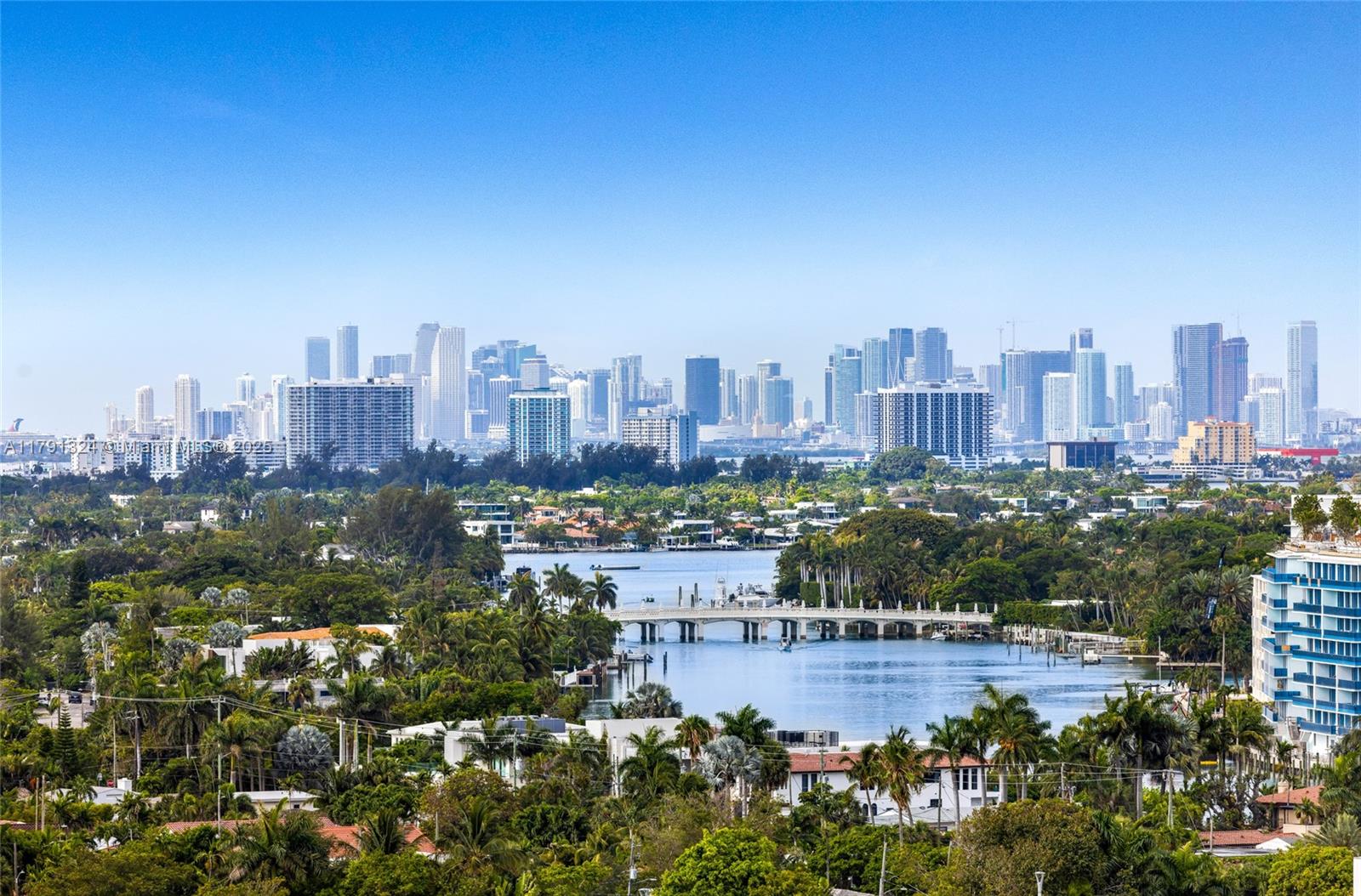 9801 Collins Avenue, Unit 17R Bal Harbour, FL 33154 - Photo 43 of 46 a view of a city with tall buildings