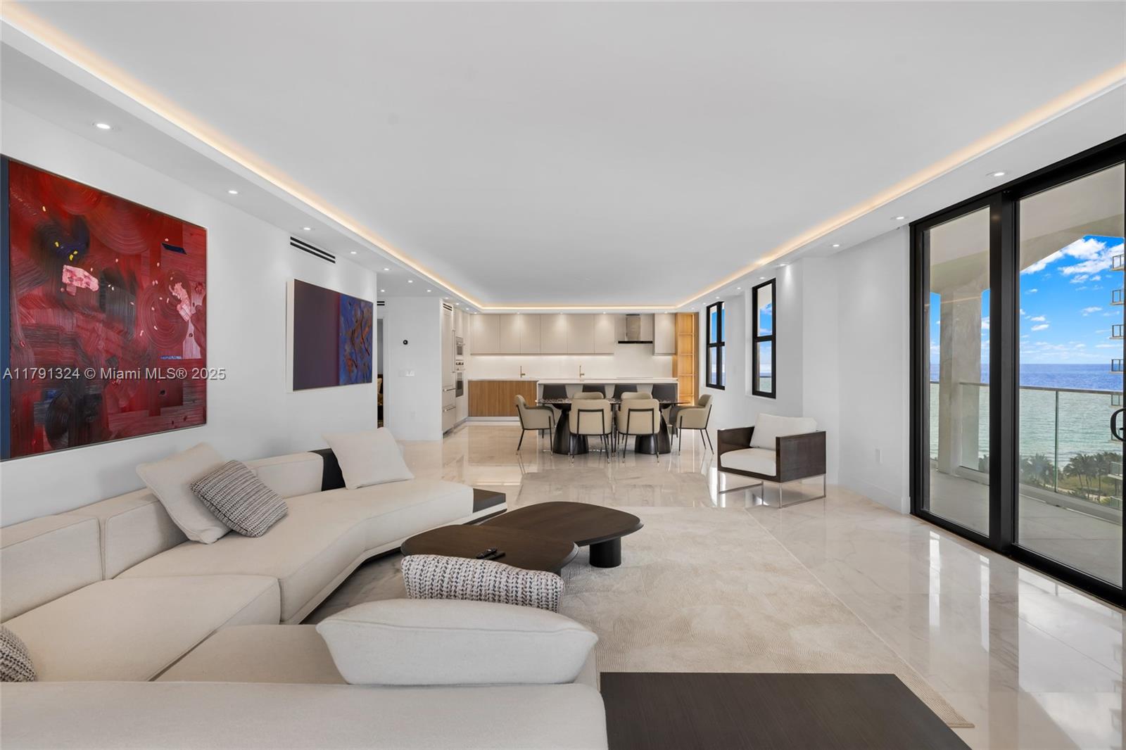 9801 Collins Avenue, Unit 17R Bal Harbour, FL 33154 - Photo 46 of 46 a living room with furniture and a large window