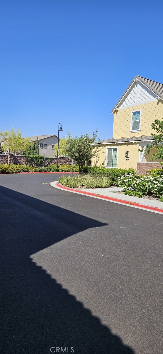 8787 Wanderlin Place Chino, CA 91708 - Photo 12 of 14 a view of a city street from a balcony
