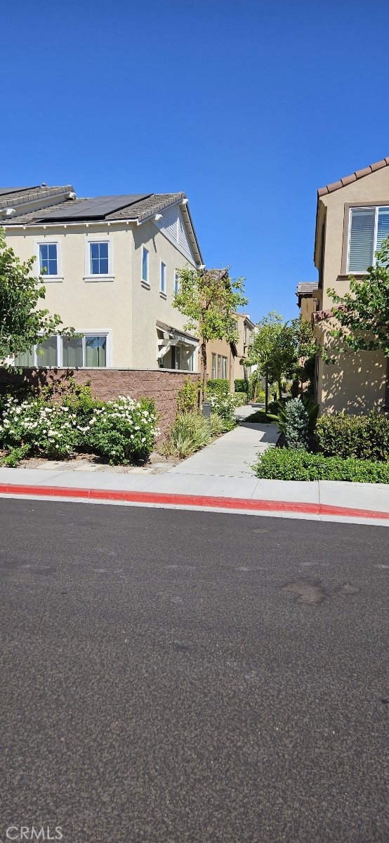 8787 Wanderlin Place Chino, CA 91708 - Photo 14 of 14 a view of a house with a street