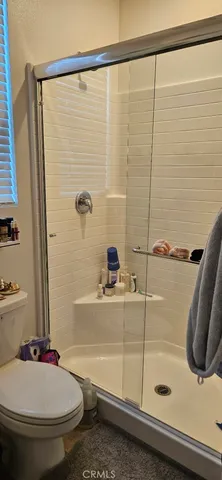a bathroom with a sink and a shower
