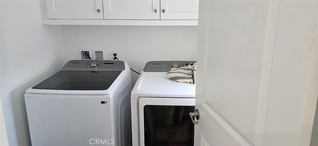 8787 Wanderlin Place Chino, CA 91708 - Photo 7 of 14 a utility room with dryer and washer