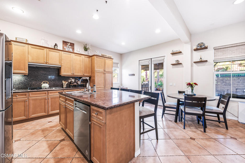 4741 Westwood Street Simi Valley, CA 93063 - Photo 11 of 50 a kitchen with counter top space and appliances
