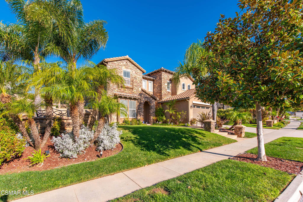 4741 Westwood Street Simi Valley, CA 93063 - Photo 2 of 50 a view of a white house next to a yard with big trees