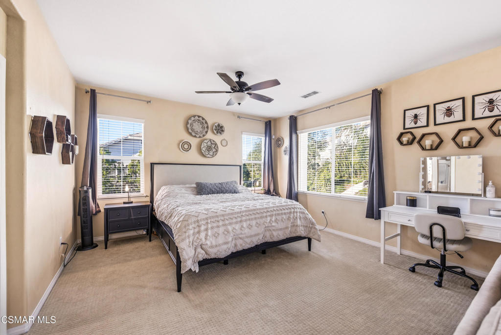 4741 Westwood Street Simi Valley, CA 93063 - Photo 22 of 50 a bedroom with a bed dresser and a window