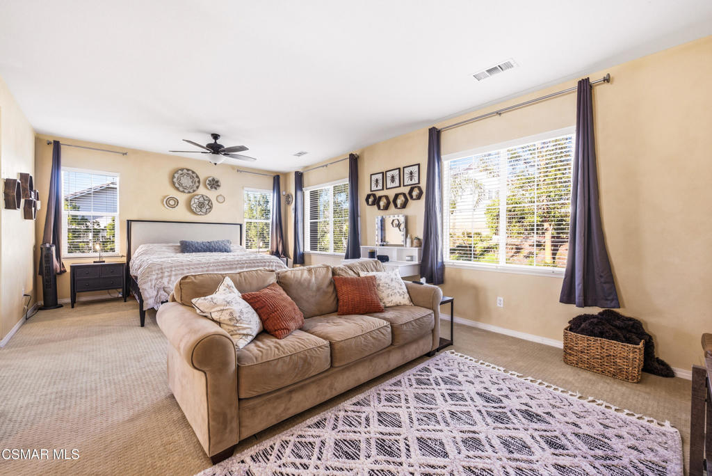 4741 Westwood Street Simi Valley, CA 93063 - Photo 23 of 50 a living room with furniture and a window
