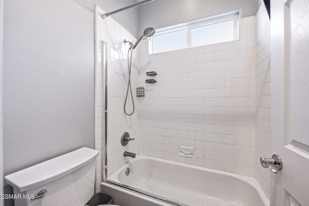 4741 Westwood Street Simi Valley, CA 93063 - Photo 33 of 50 a bathroom with a bathtub and a shower