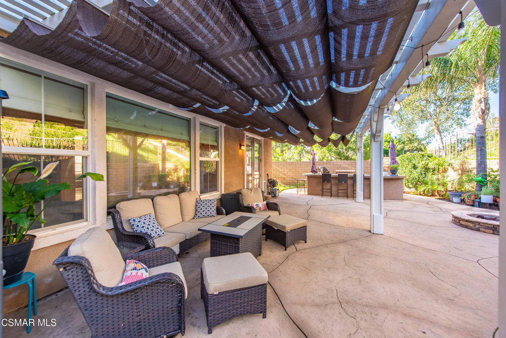 4741 Westwood Street Simi Valley, CA 93063 - Photo 40 of 50 a outdoor space with patio couches and iron fence