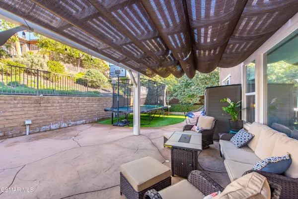 a view of yard with patio