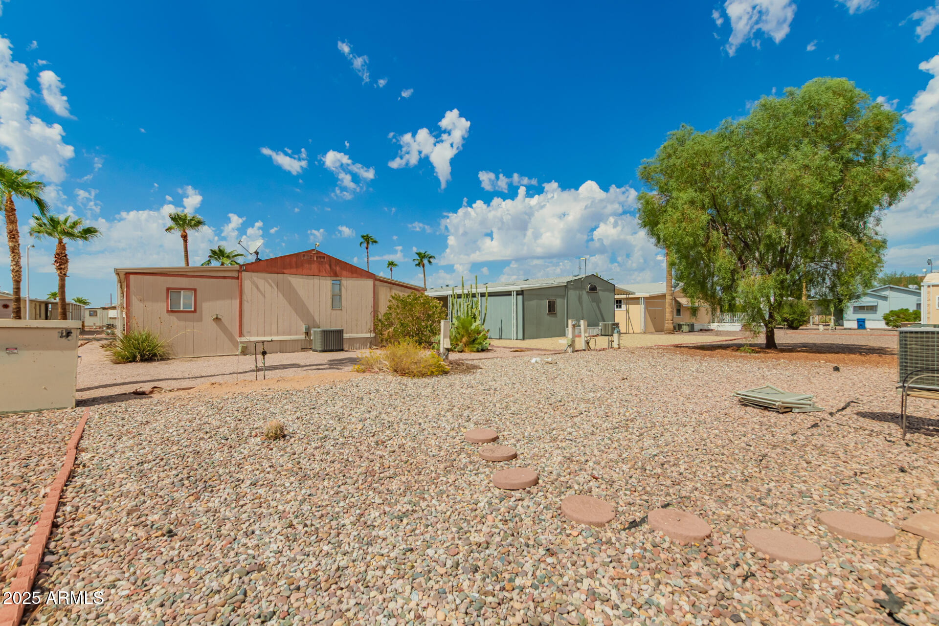 301 South Signal Butte Road, Unit 706 Apache Junction, AZ 85120 - Photo 40 of 51 a view of road and basketball court