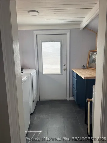 a view of a storage and utility room in a kitchen