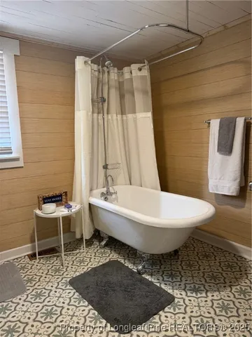 a bathroom with a toilet and a sink