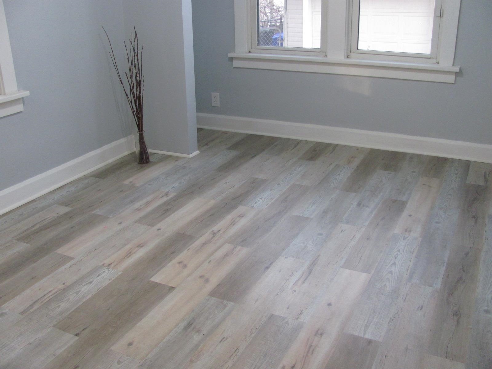 1817 Ridge Avenue Rockford, IL 61103 - Photo 13 of 48 a view of an empty room with wooden floor and a window
