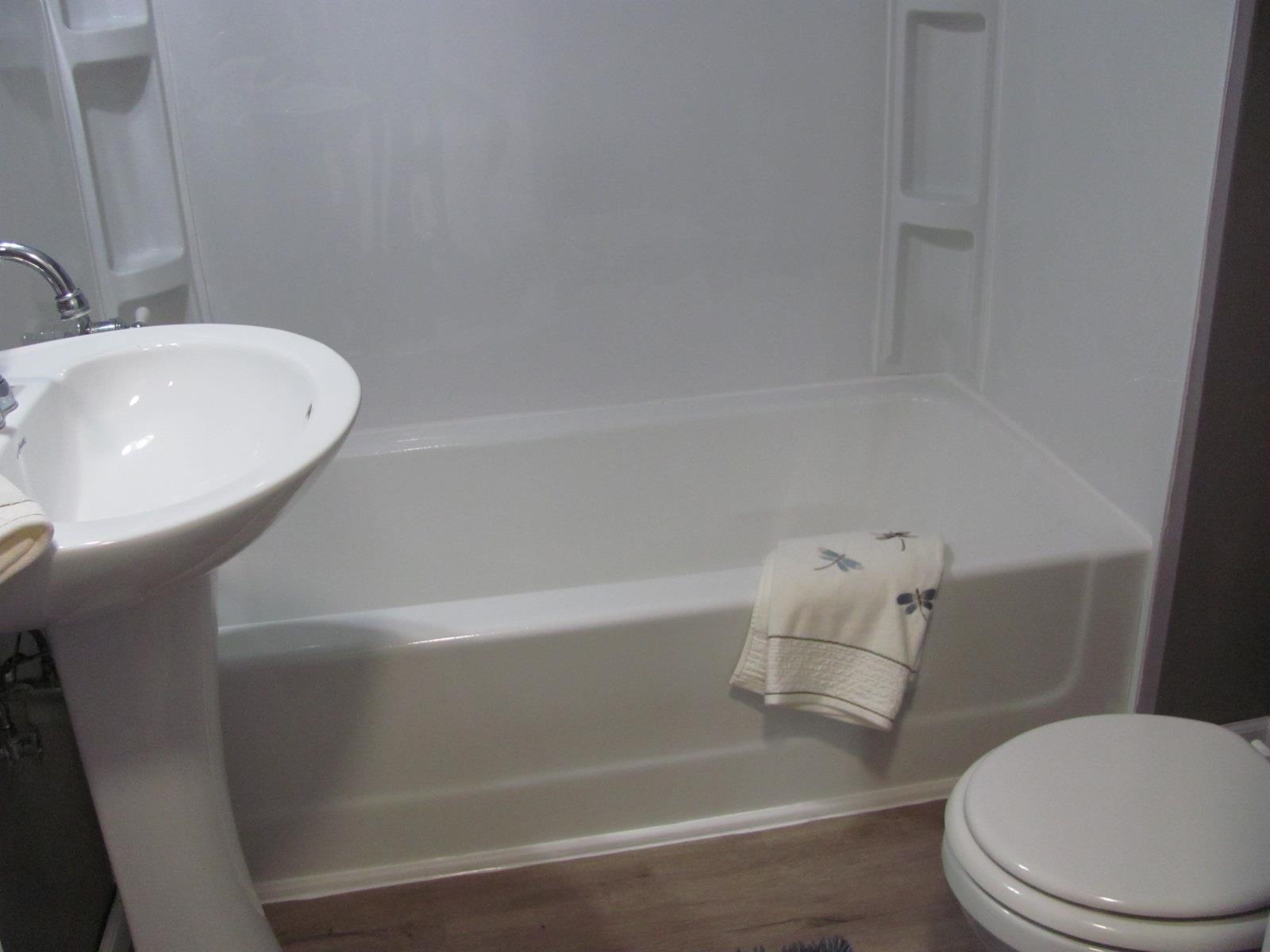 1817 Ridge Avenue Rockford, IL 61103 - Photo 16 of 48 a bathroom with a sink and a toilet