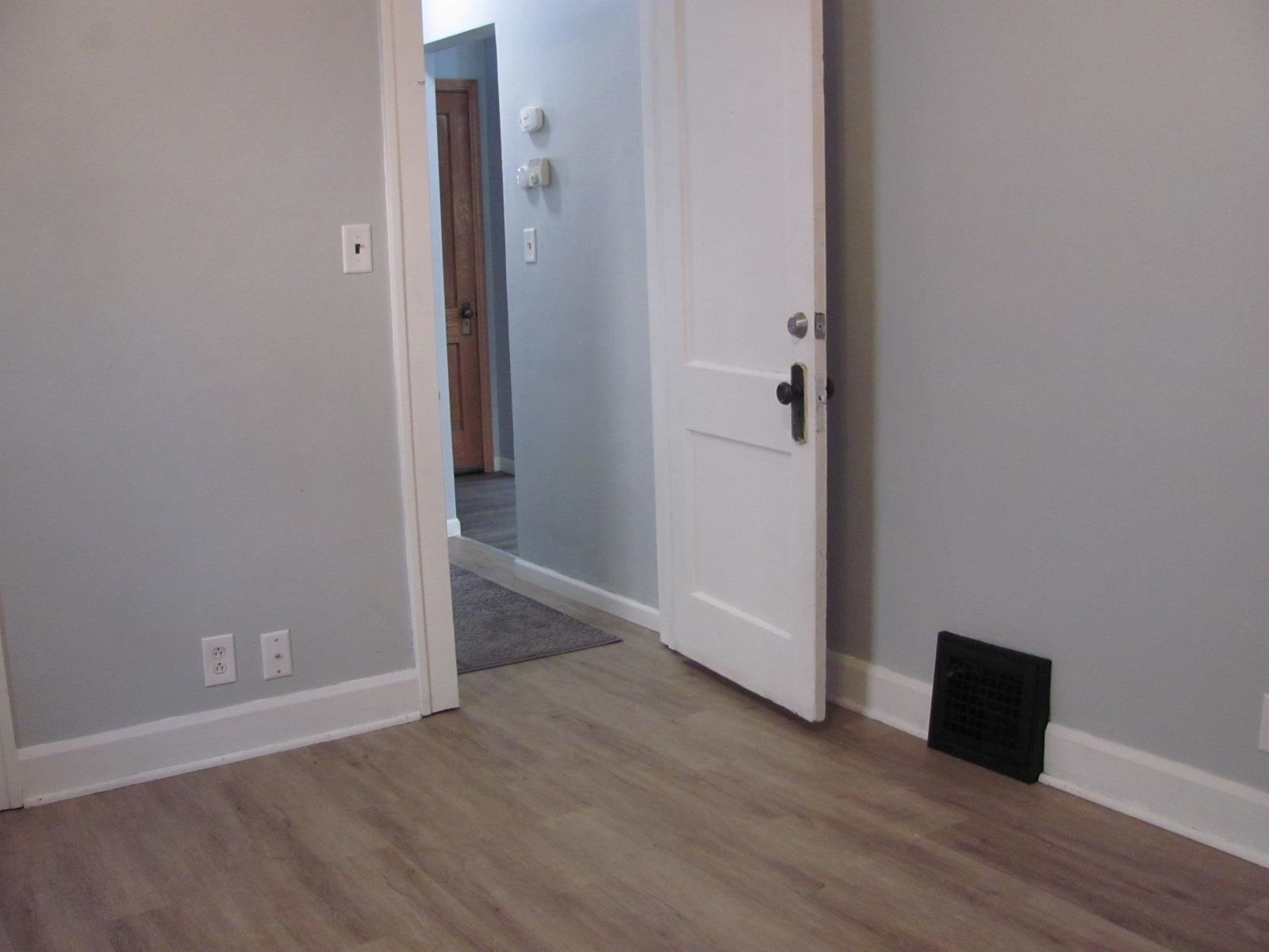 1817 Ridge Avenue Rockford, IL 61103 - Photo 21 of 48 an empty room with wooden floor and closet
