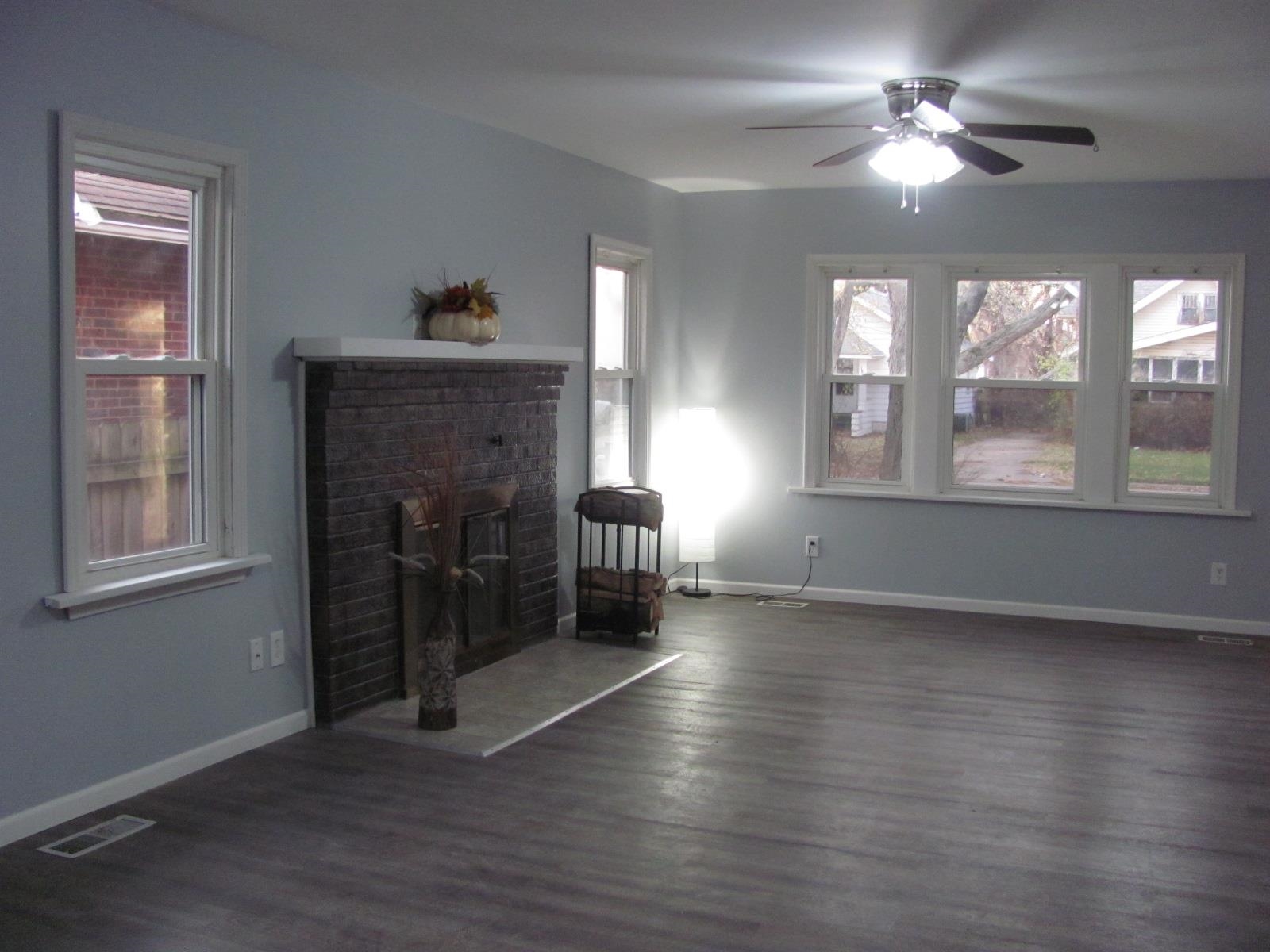 1817 Ridge Avenue Rockford, IL 61103 - Photo 26 of 48 a view of empty room with wooden floor and fan