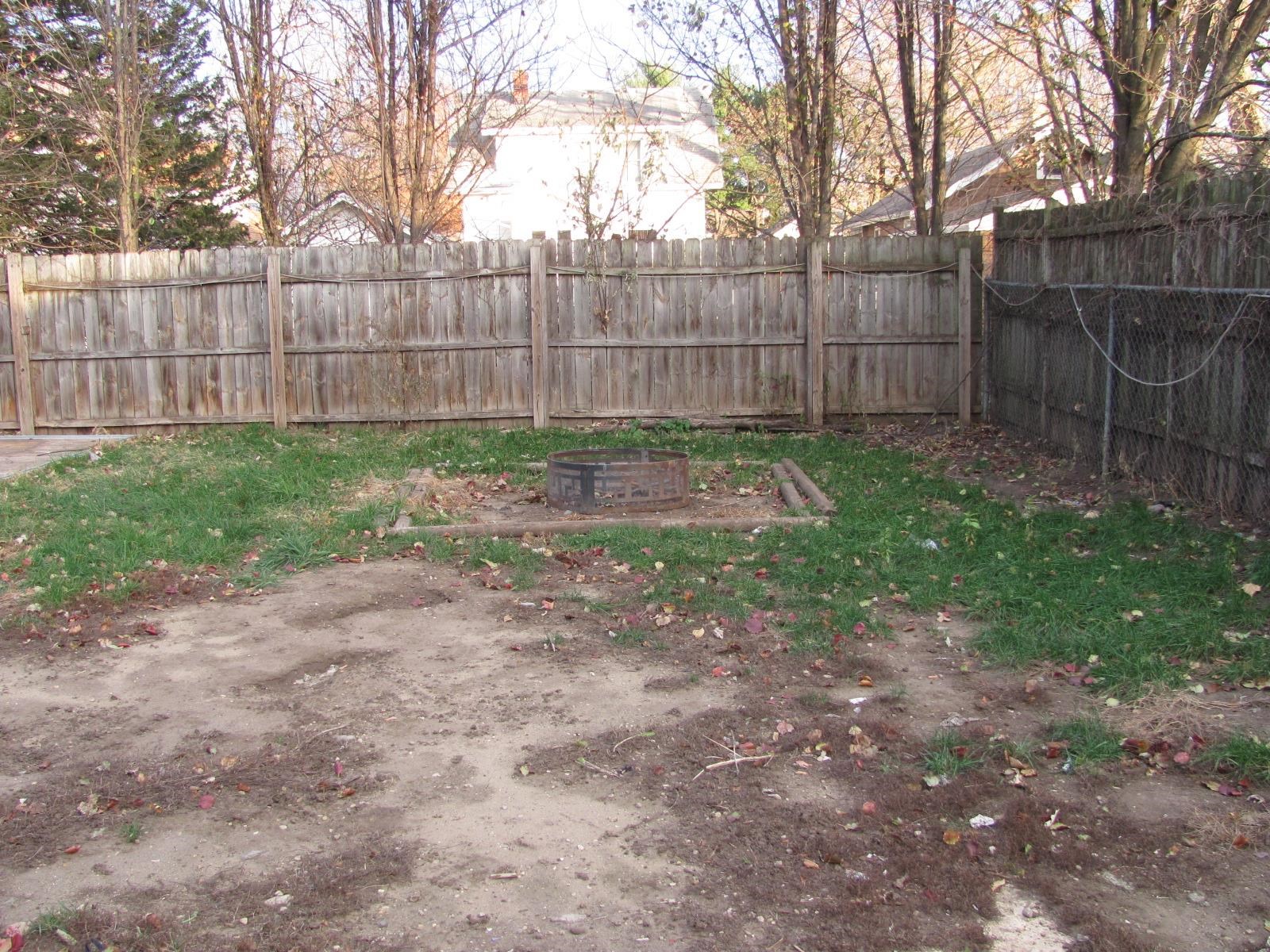1817 Ridge Avenue Rockford, IL 61103 - Photo 45 of 48 a view of a backyard with wooden fence