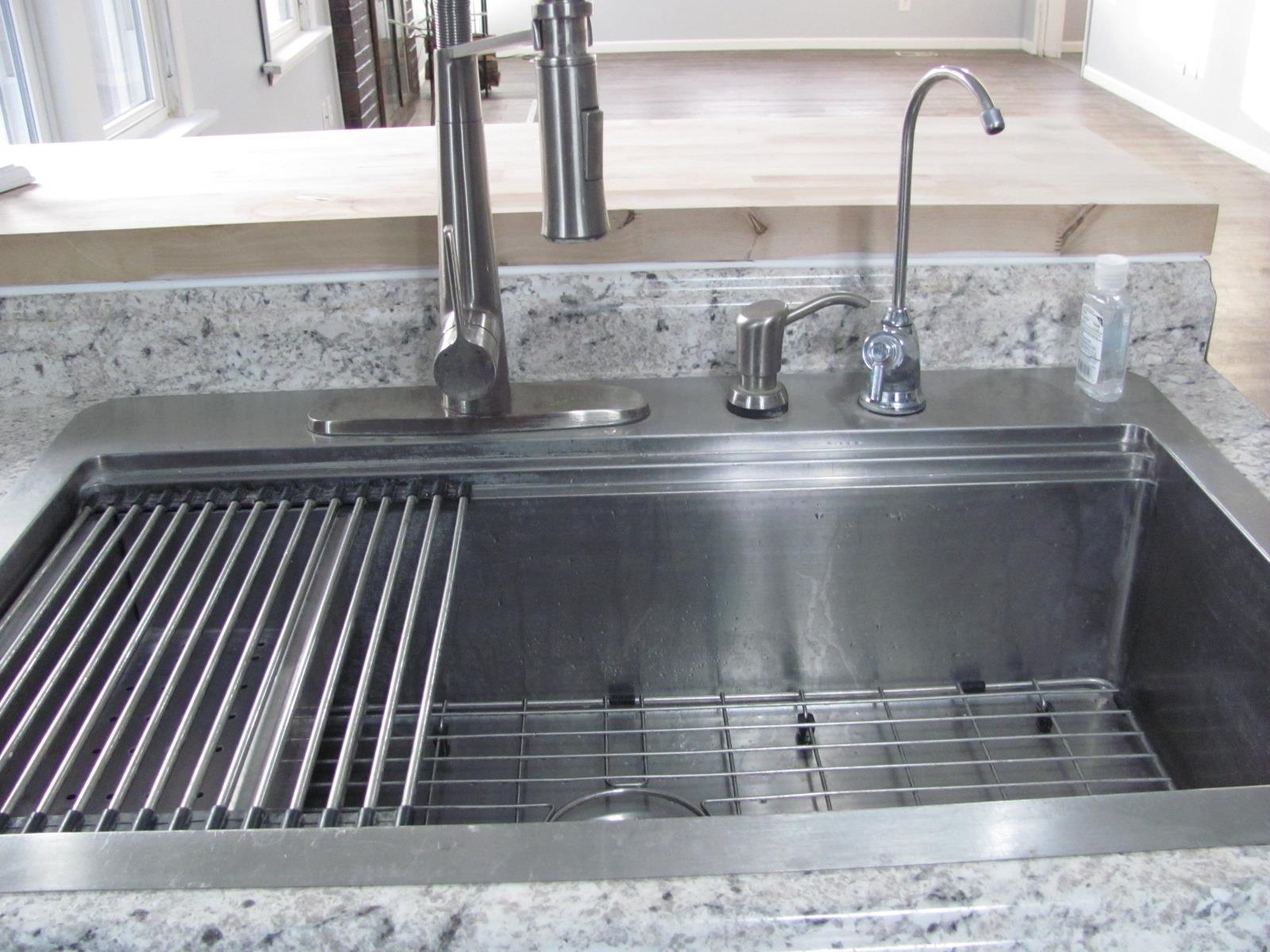 1817 Ridge Avenue Rockford, IL 61103 - Photo 10 of 48 a close view of sink and tap