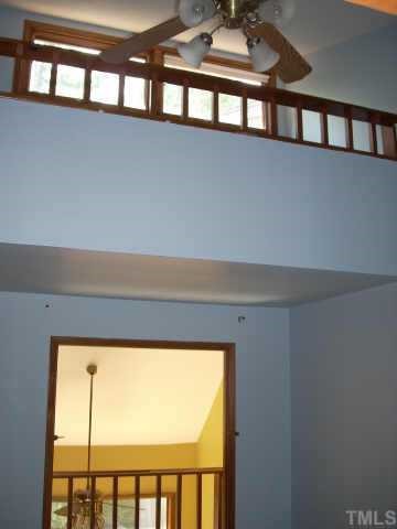 4339 Sunscape Lane Raleigh, NC 27613 - Photo 8 of 10 Looking upwards in master with vaulted ceiling and fan toward loft.